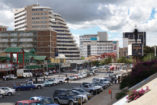 View on Independence Avenue in the year 2008. This parking place does not exist anymore and new buildings have taken over the place