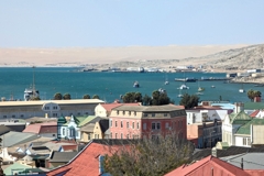 Lüderitz is surrounded on all sides by desert sand and rocks inland.