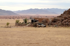 The lodge is situated in a secluded location on a mountainside