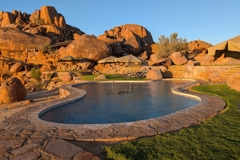 The pool at Canyon Lodge is located away from the houses